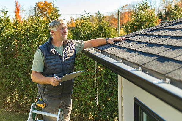 Professional Roofing technician working in Riddle, OR
